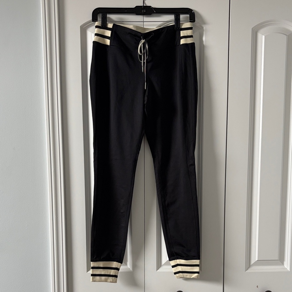 Athleta Black Track Pants with Cream Stripe Details
